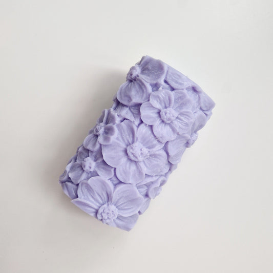 lavender floral pillar candle side view